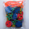 Игрушка-шнуровка